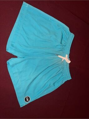 Cove brand Turquoise swim shorts size 30